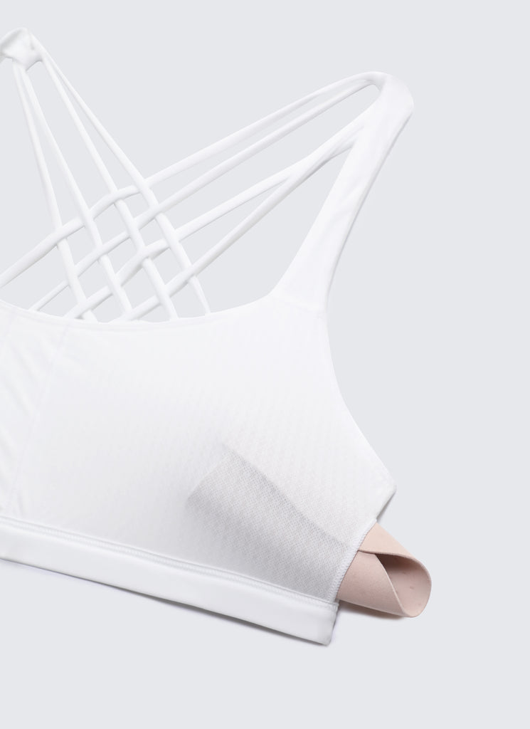 CRZ YOGA Women's Yoga Light Support Nakedfeel Strappy Bra Low Cut Navy