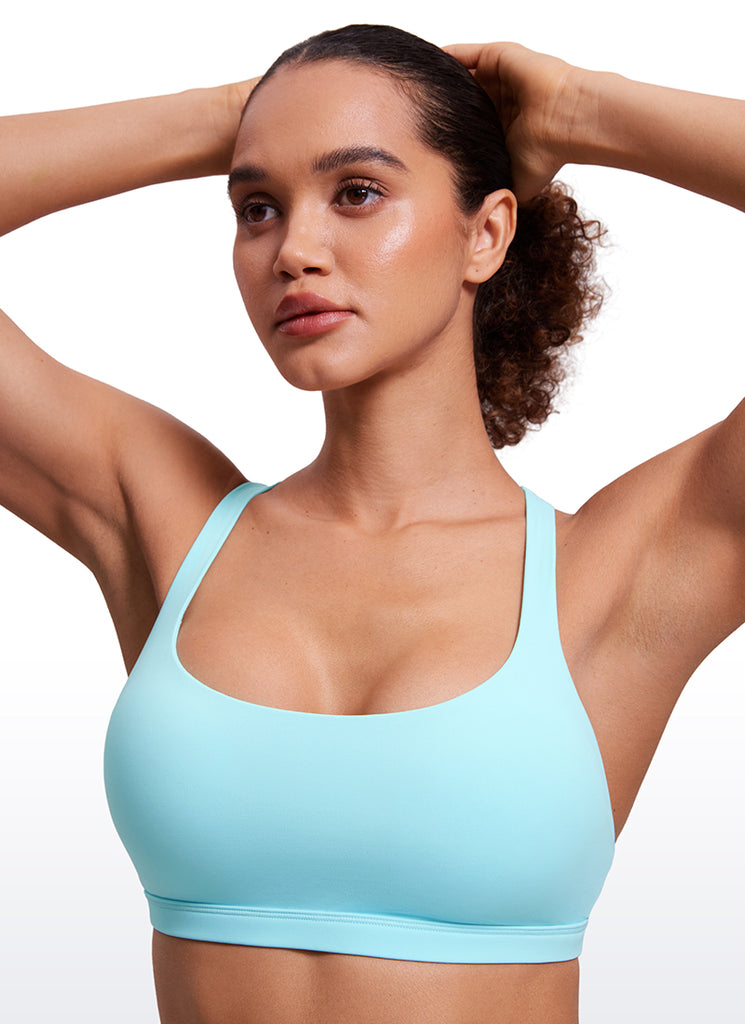 CRZ YOGA Women's Yoga Light Support Nakedfeel Strappy Bra Low Cut Hydra Blue