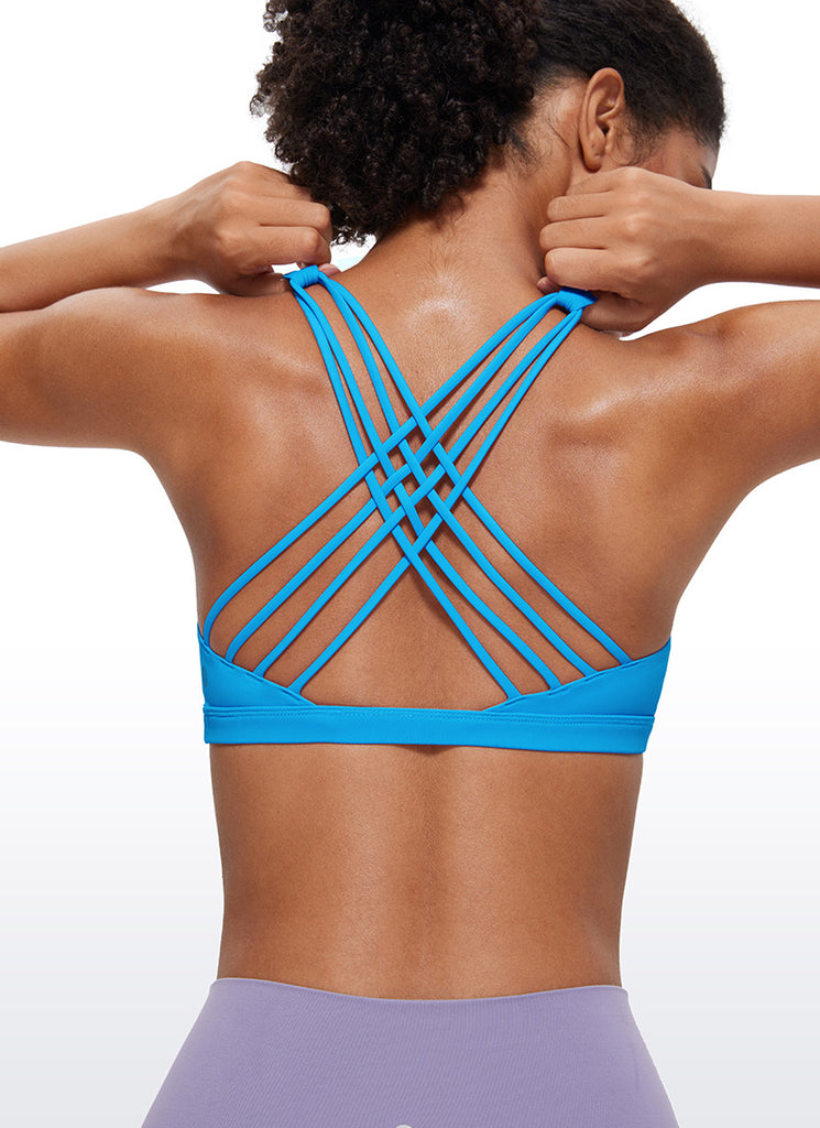 CRZ YOGA Women's Yoga Light Support Nakedfeel Strappy Bra Low Cut Madagascar Blue