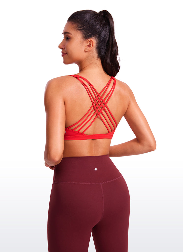 CRZ YOGA Women's Yoga Light Support Nakedfeel Strappy Bra Low Cut Deep Red