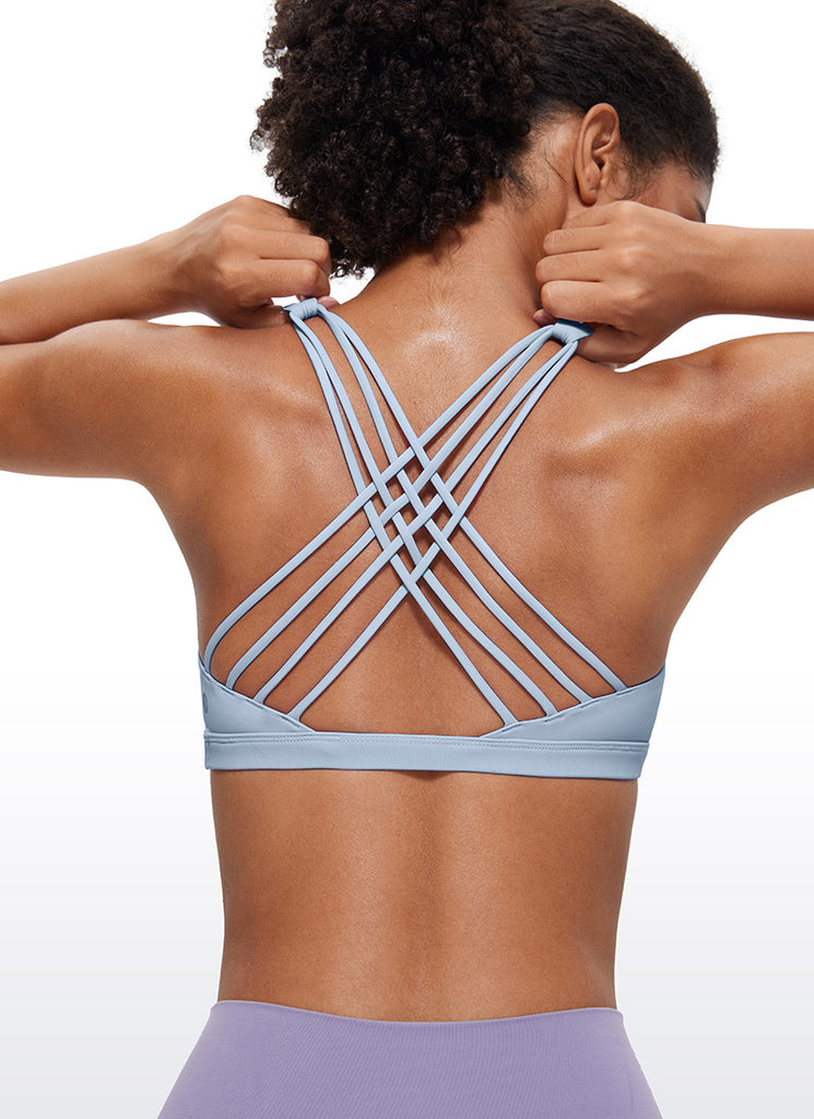 CRZ YOGA Women's Yoga Light Support Nakedfeel Strappy Bra Low Cut Cambric Blue