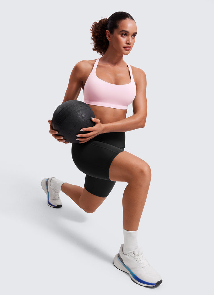 CRZ YOGA Women's Yoga Light Support Nakedfeel Strappy Bra Low Cut Strawberry Pink