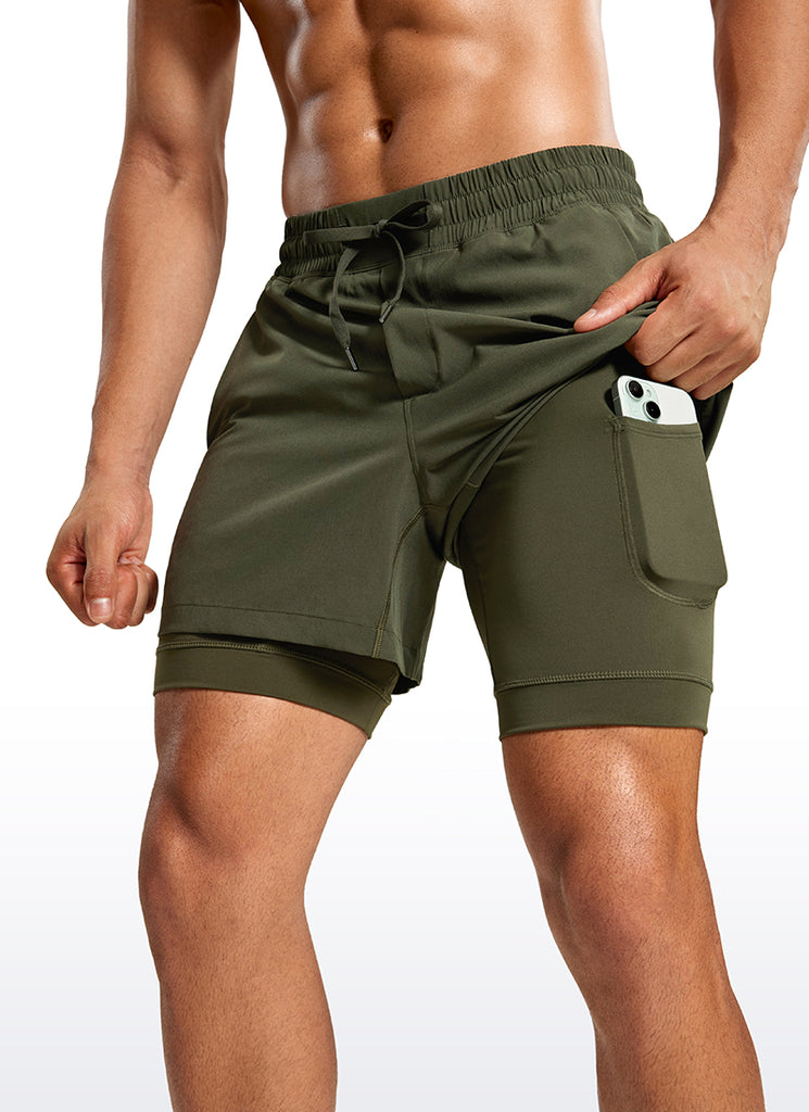 CRZ YOGA Men's Train Relaxed Fit Feathery-Fit 2 in 1 Shorts 5'' with Long Liner Dark Olive
