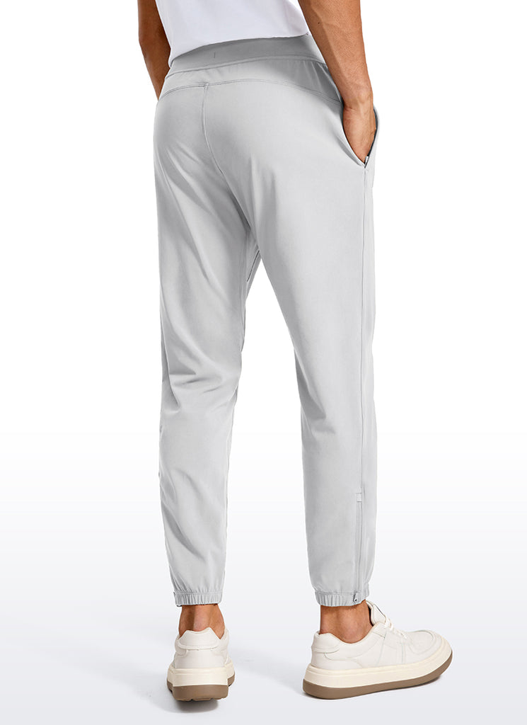 CRZ YOGA Men's Run Slim Fit On the Travel Joggers 28''- Ankle Zipper Platinum Grey