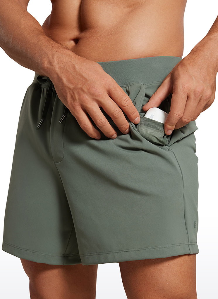 CRZ YOGA Men's Train Relaxed Fit On the Travel Linerless Shorts 5'' Grey Sage