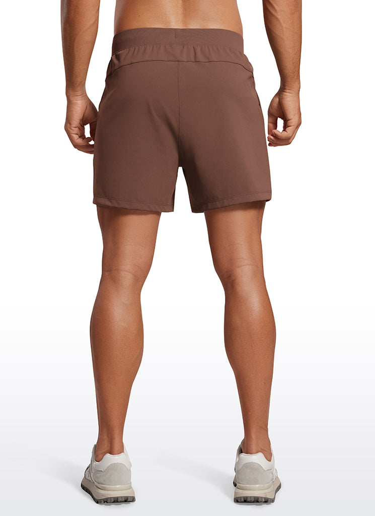 CRZ YOGA Men's Train Relaxed Fit On the Travel Linerless Shorts 5'' Coffee Brown