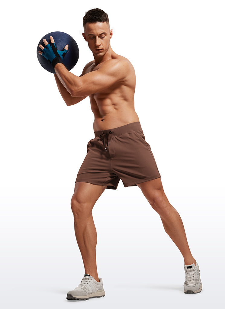 CRZ YOGA Men's Train Relaxed Fit On the Travel Linerless Shorts 5'' Coffee Brown