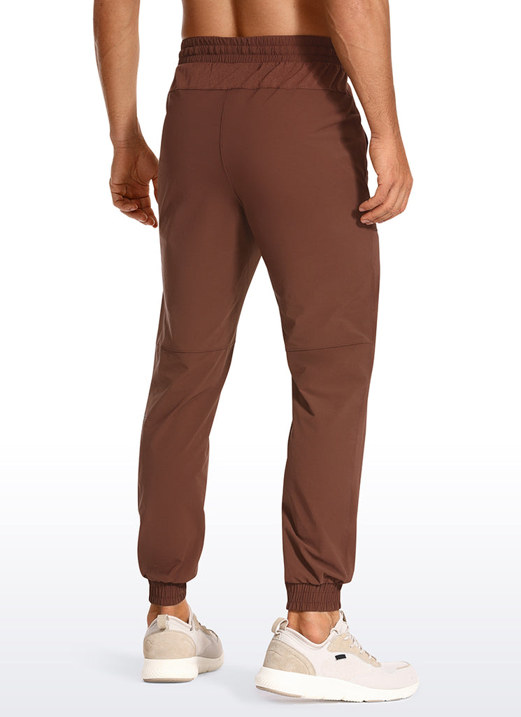 CRZ YOGA Men's Train Slim Fit Quick Dry Joggers 29''- Zip Pockets Dark Brown