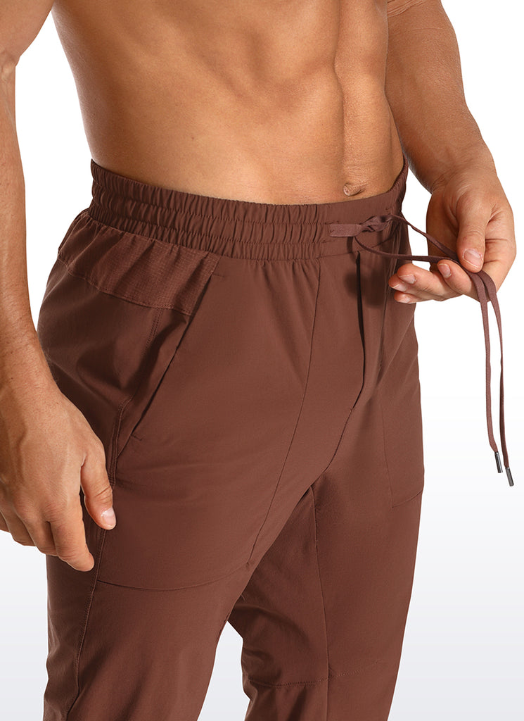 CRZ YOGA Men's Train Slim Fit Quick Dry Joggers 29''- Zip Pockets Dark Brown