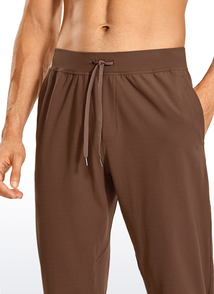 CRZ YOGA Men's Train Relaxed Fit On the Travel Pants 30'' Dark Brown