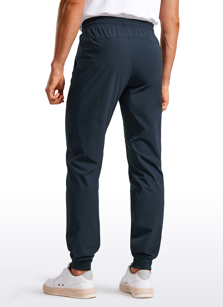 CRZ YOGA Men 31" Lightweight Water Resistant with Zip Pockets Joggers Ink Gray