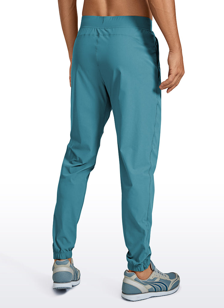 CRZ YOGA Men's Running Slim Fit Lightweight Joggers 29"-Zipper Pockets Chambray Blue