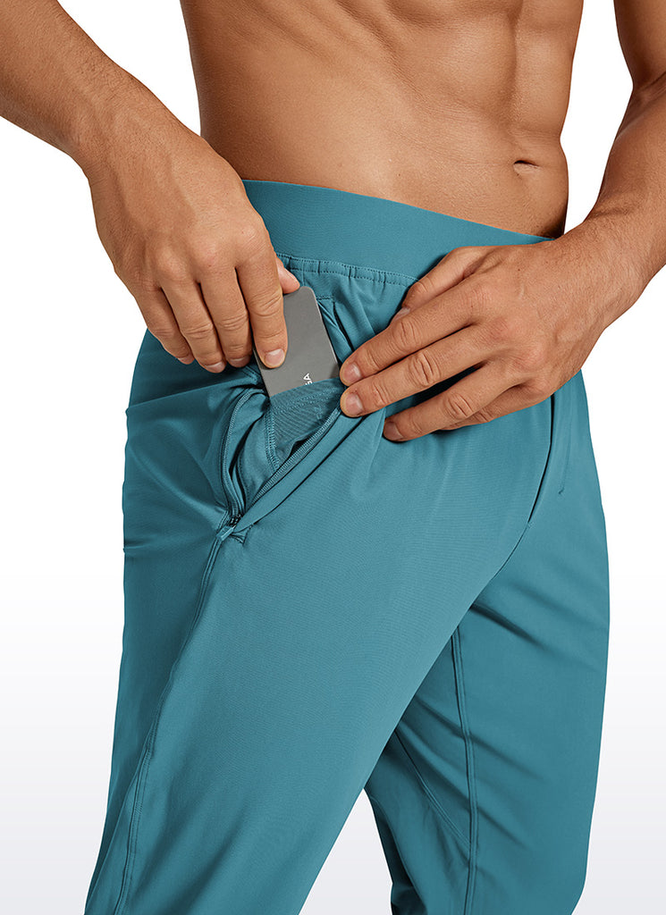 CRZ YOGA Men's Running Slim Fit Lightweight Joggers 29"-Zipper Pockets Washed Blue