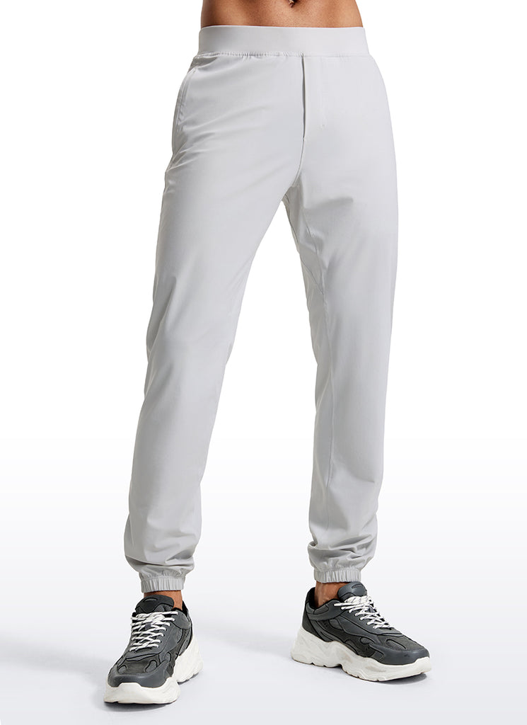 CRZ YOGA Men's Running Slim Fit Lightweight Joggers 31"-Zipper Pockets Platinum Grey