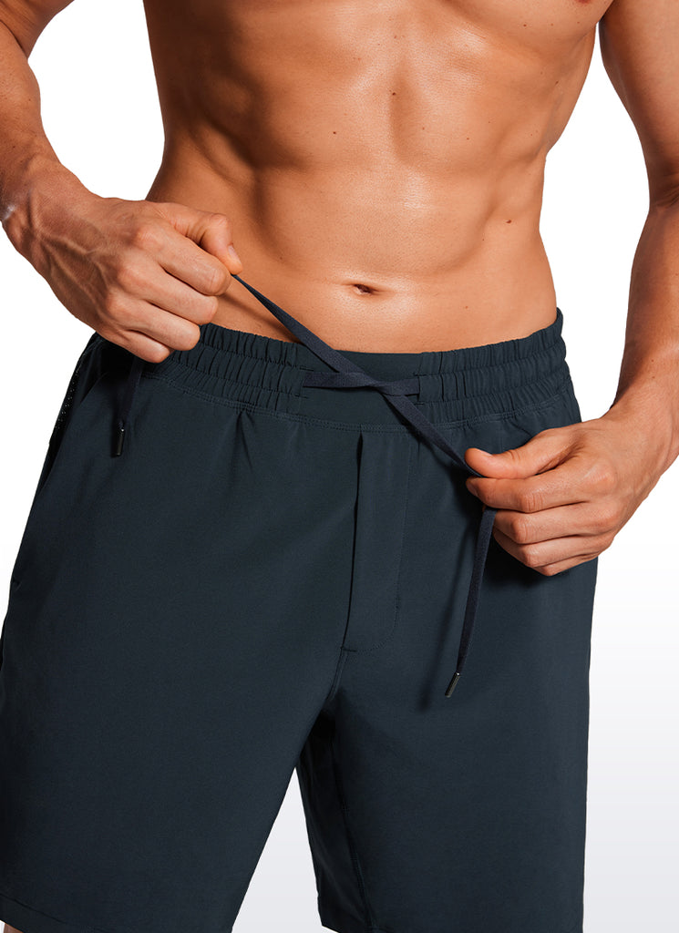 CRZ YOGA Men's Swim Trunks 7'' Mesh Lining with Zipper Pockets True Navy