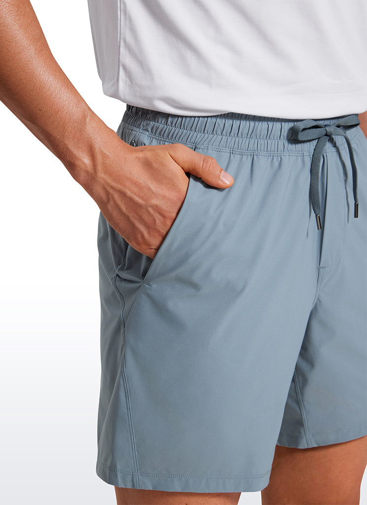 CRZ YOGA Men's Training Quick Dry Pocketed Linerless Shorts 7'' Belgian Blue