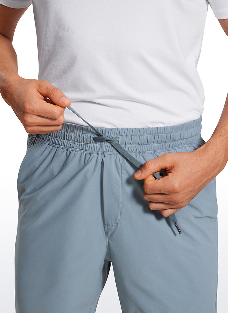 CRZ YOGA Men's Training Quick Dry Pocketed Linerless Shorts 7'' Belgian Blue