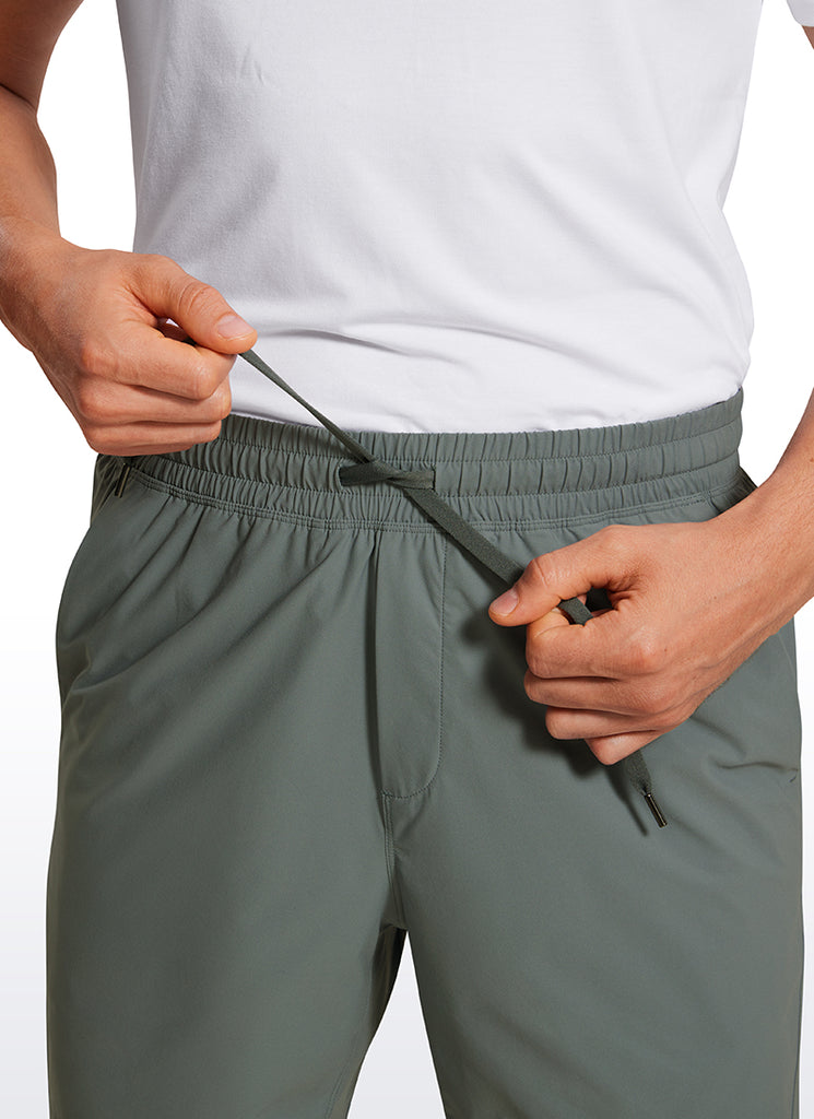 CRZ YOGA Men's Training Quick Dry Pocketed Linerless Shorts 7'' Gull Gray