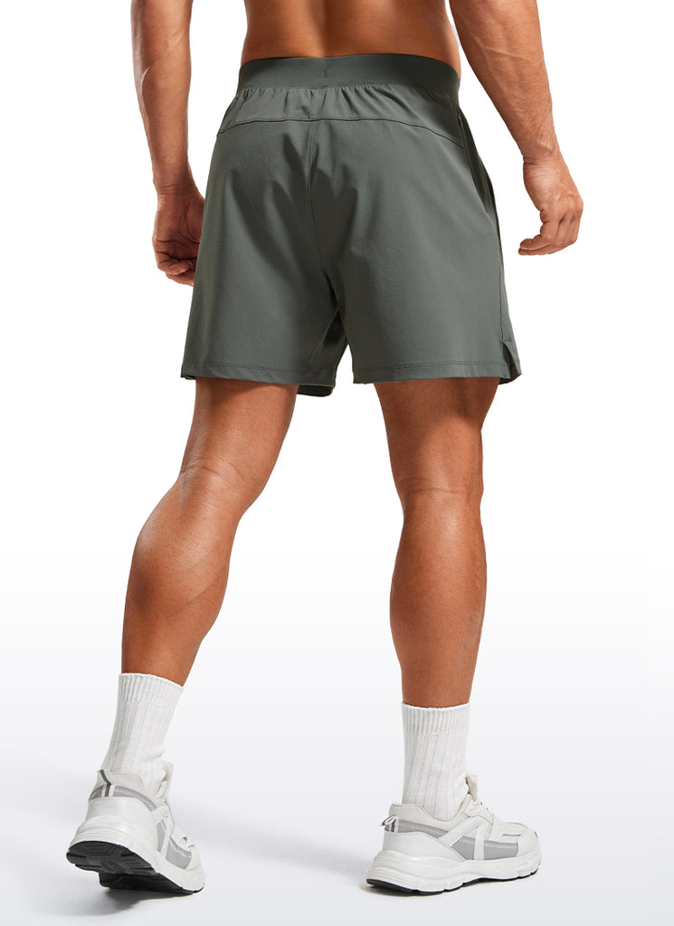 CRZ YOGA Men's Quick Dry Lightweight Gym Shorts with Zipper Pocket Stelindigo