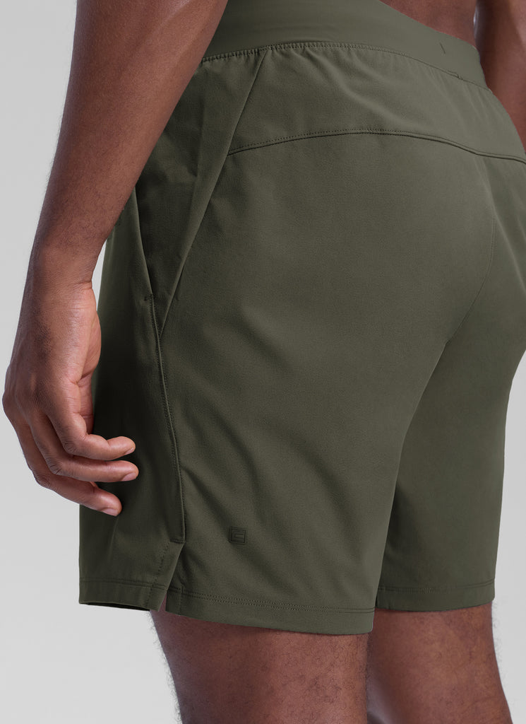 CRZ YOGA Men's Workout Classic FIt Quick Dry Pocket Shorts  7" Dark Olive