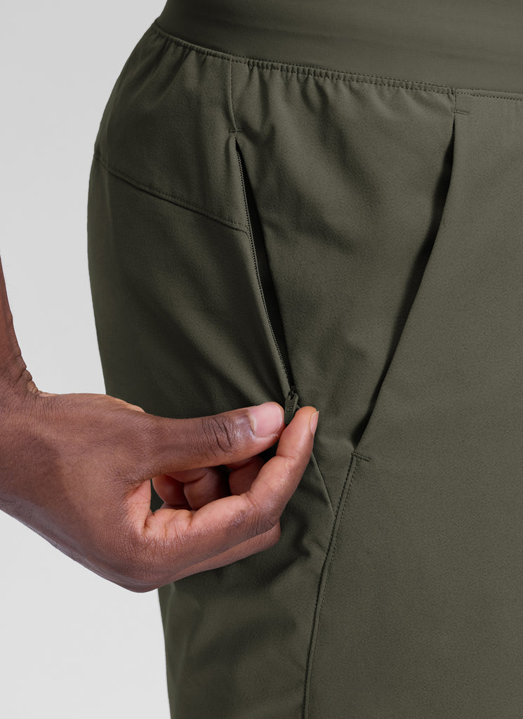 CRZ YOGA Men's Workout Classic FIt Quick Dry Pocket Shorts  7" Dark Olive