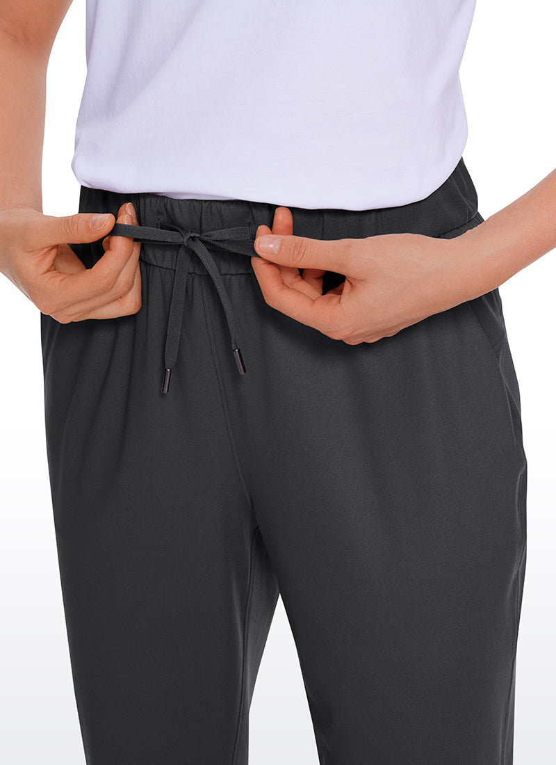 Pantalon 7/8 extensible avec cordon de serrage et poches 27''