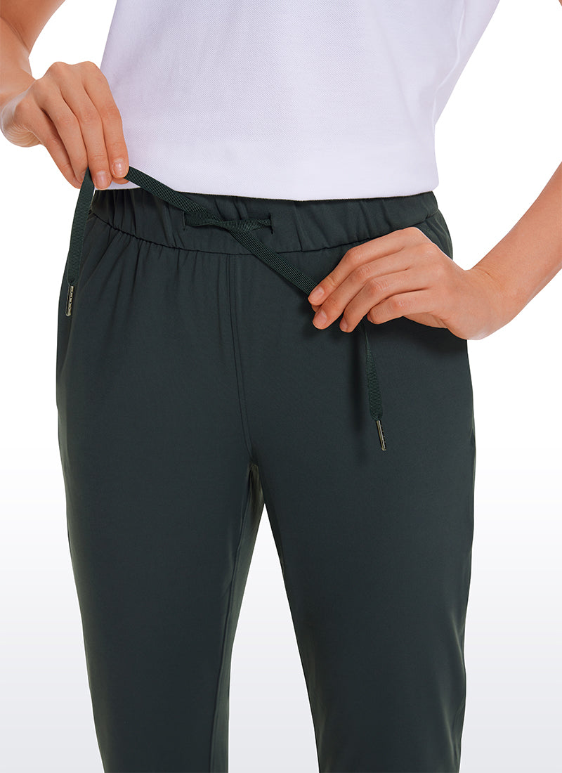 Pantalon 7/8 extensible avec cordon de serrage et poches 27''