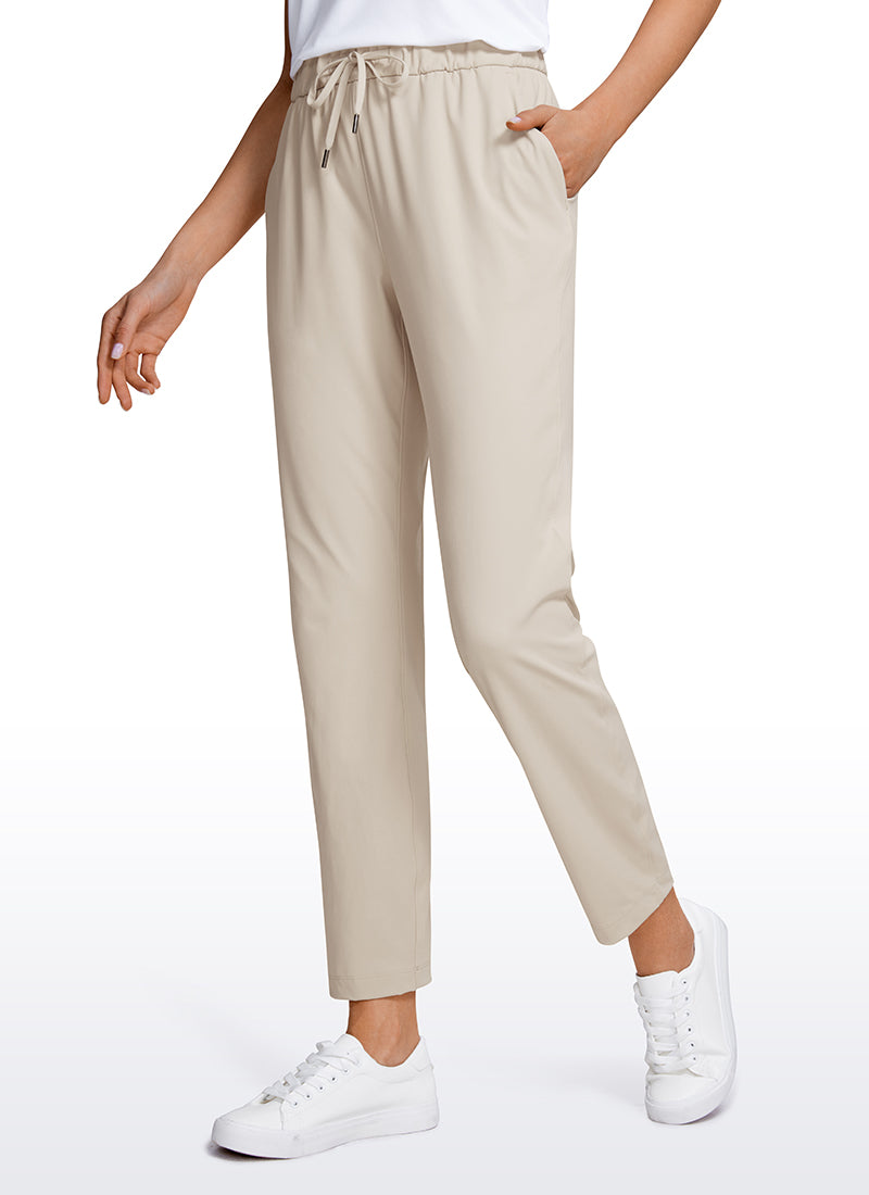 Pantalon 7/8 extensible avec cordon de serrage et poches 27''