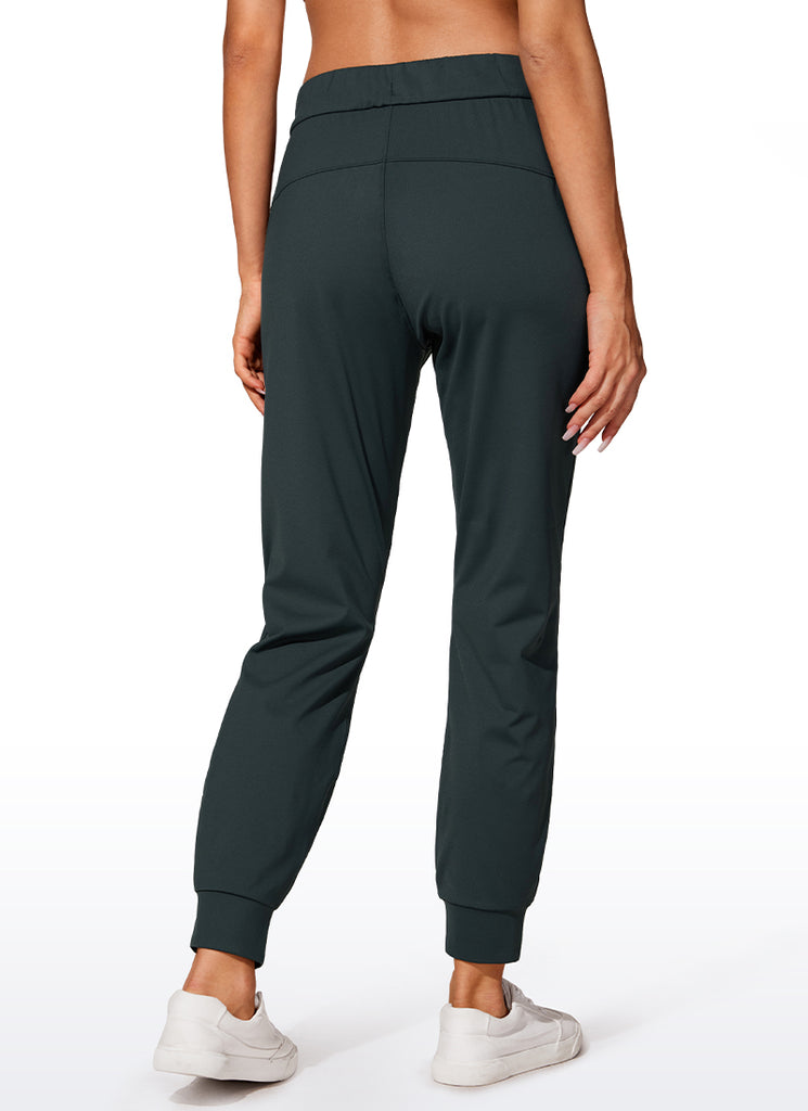 CRZ YOGA Women's Travel Slim Fit Stretch Drawstring Jogger 27'' Melanite