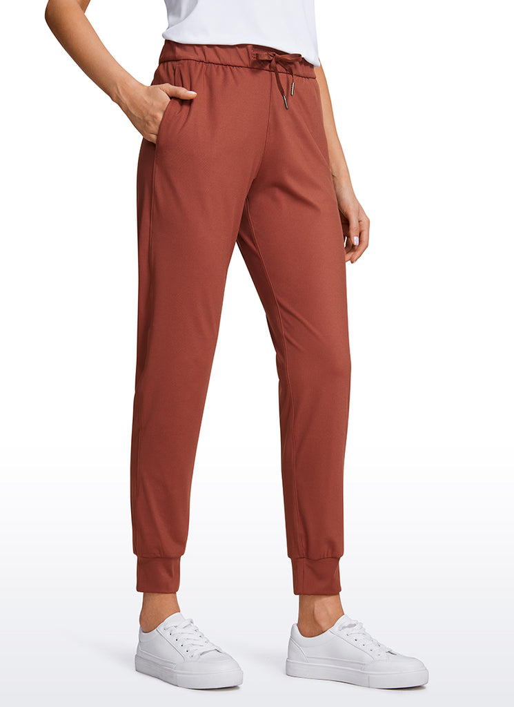 CRZ YOGA Women's Travel Slim Fit Stretch Drawstring Jogger 27'' The Cognac Brown