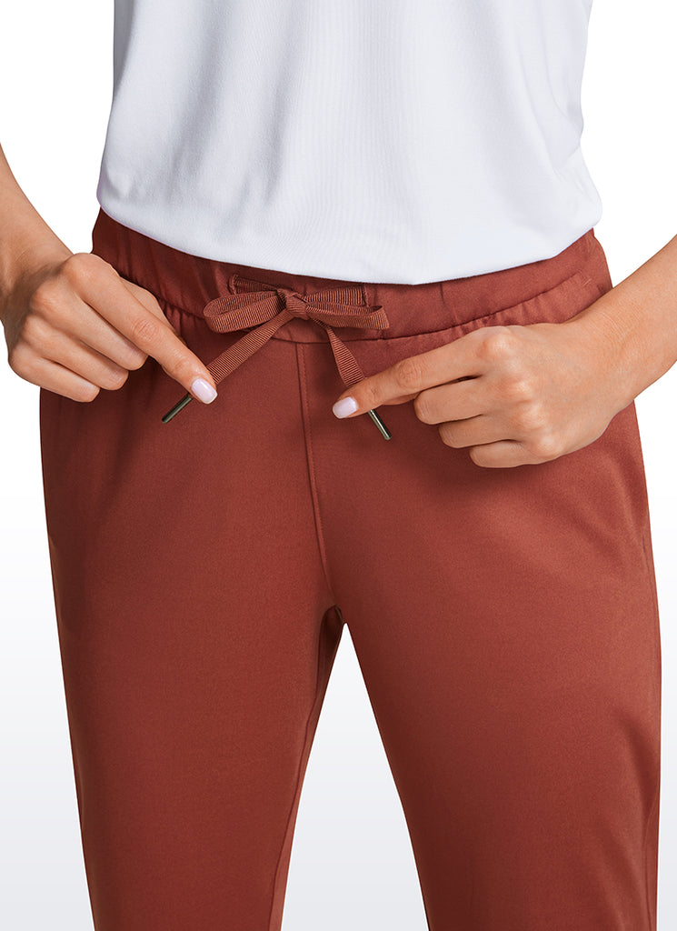 CRZ YOGA Women's Travel Slim Fit Stretch Drawstring Jogger 27'' The Cognac Brown