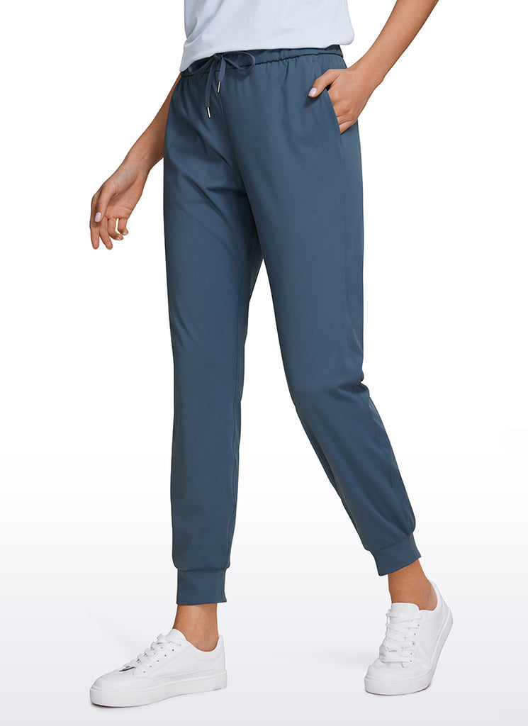 CRZ YOGA Women's Travel Slim Fit Stretch Drawstring Jogger 27'' Slate Blue
