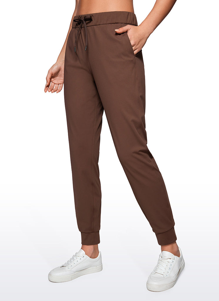 CRZ YOGA Women's Travel Slim Fit Stretch Drawstring Jogger 27'' Coffee Brown