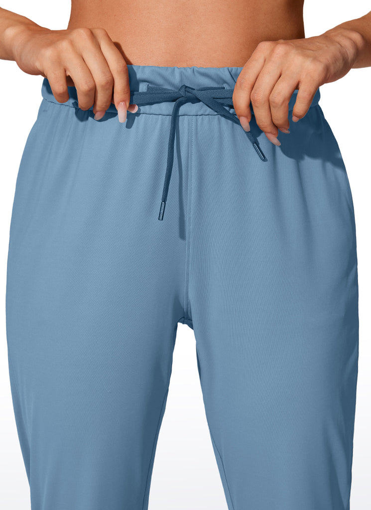 CRZ YOGA Women's Travel Slim Fit Stretch Drawstring Jogger 27'' Milky White