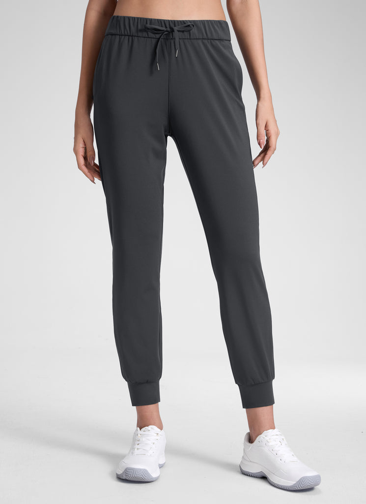 CRZ YOGA Women's Travel Slim Fit Stretch Drawstring Jogger 27'' Milky White