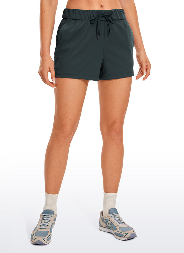 CRZ YOGA Women's Travel Stretch Mid-Rise Drawstring Shorts 2.5" Grey Olive