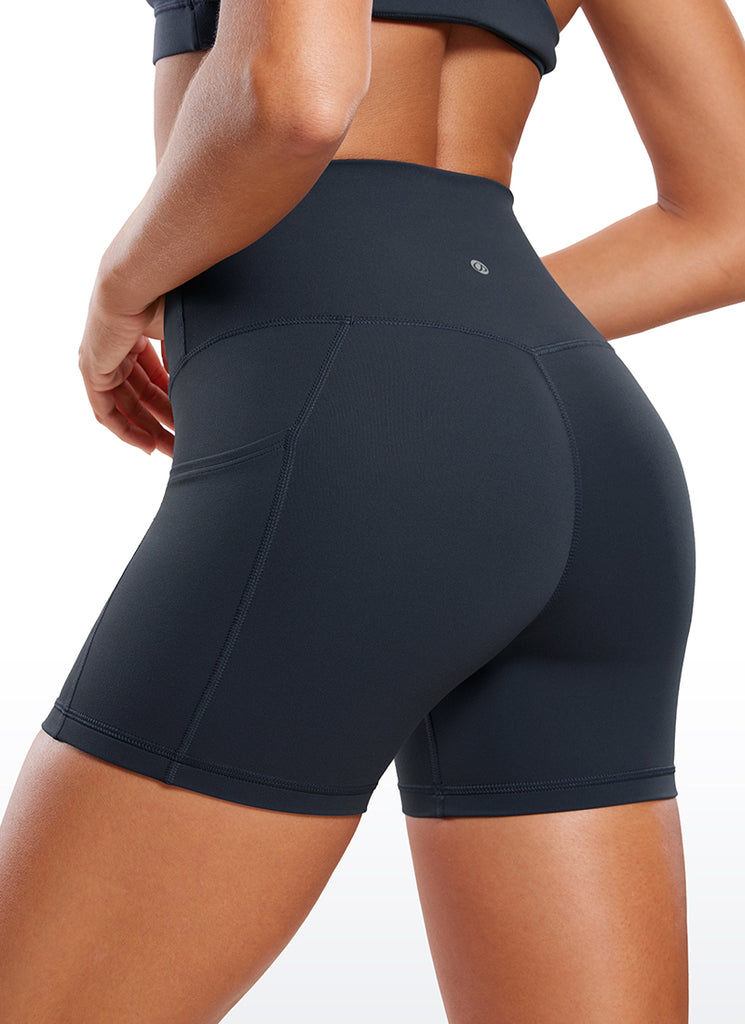 CRZ YOGA Women's High Rise Butterluxe V Cross Waist Pockets Shorts 4'' True Navy