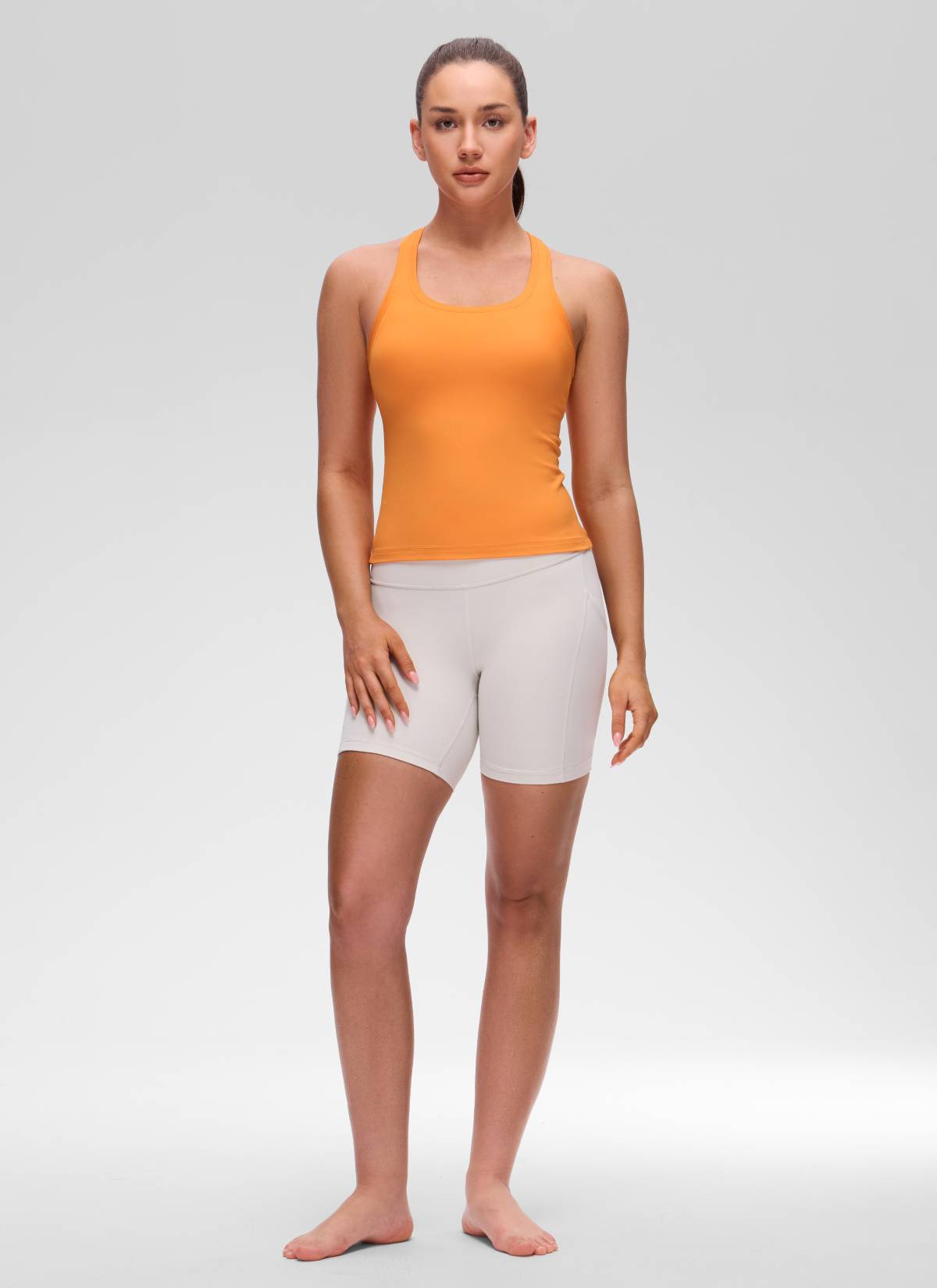 גופיית יוגה לנשים CRZ YOGA בגזרת Tight Fit Butterluxe עם צווארון עגול וגב רייסר, בצבע כתום טייגר