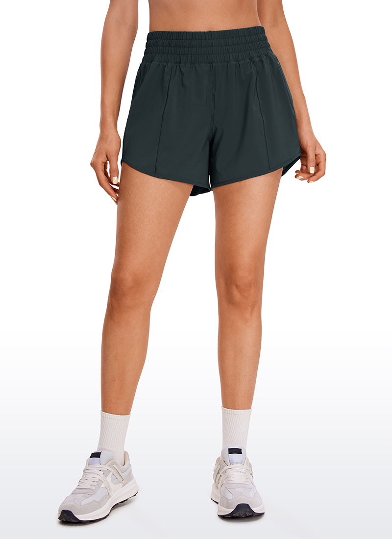 Feathery-Fit Soft High Rise Mesh Liner Shorts with Zip Pockets 4''