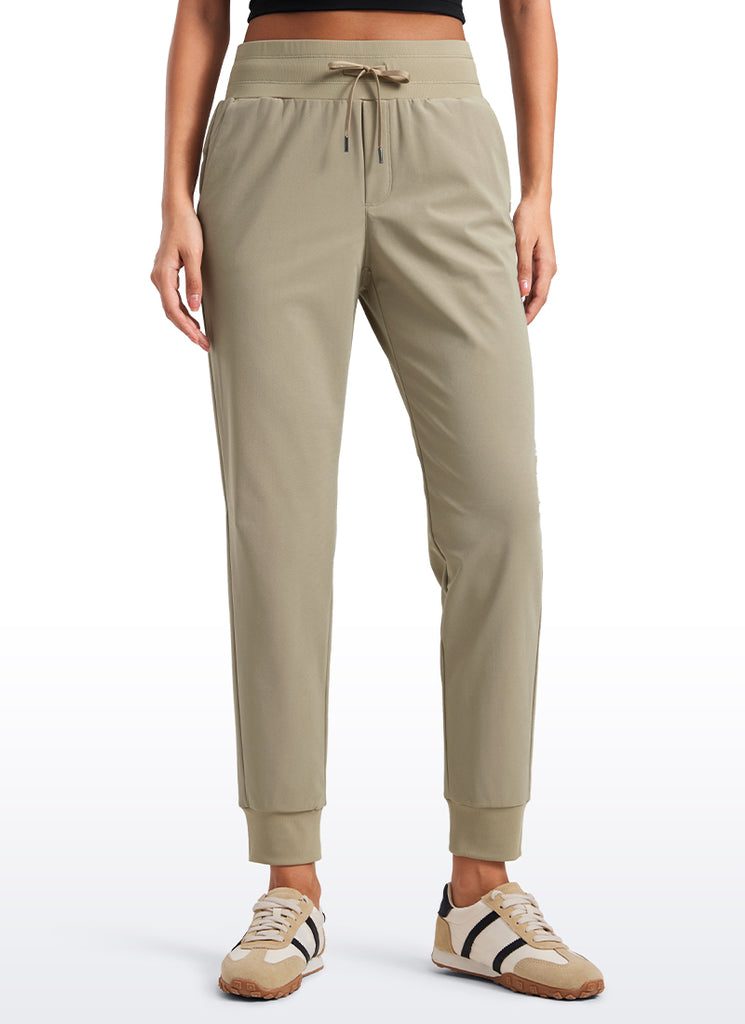 CRZ YOGA Women's Golf All-day Slim-Fit Joggers 27.5'' with pockets Light Army Green