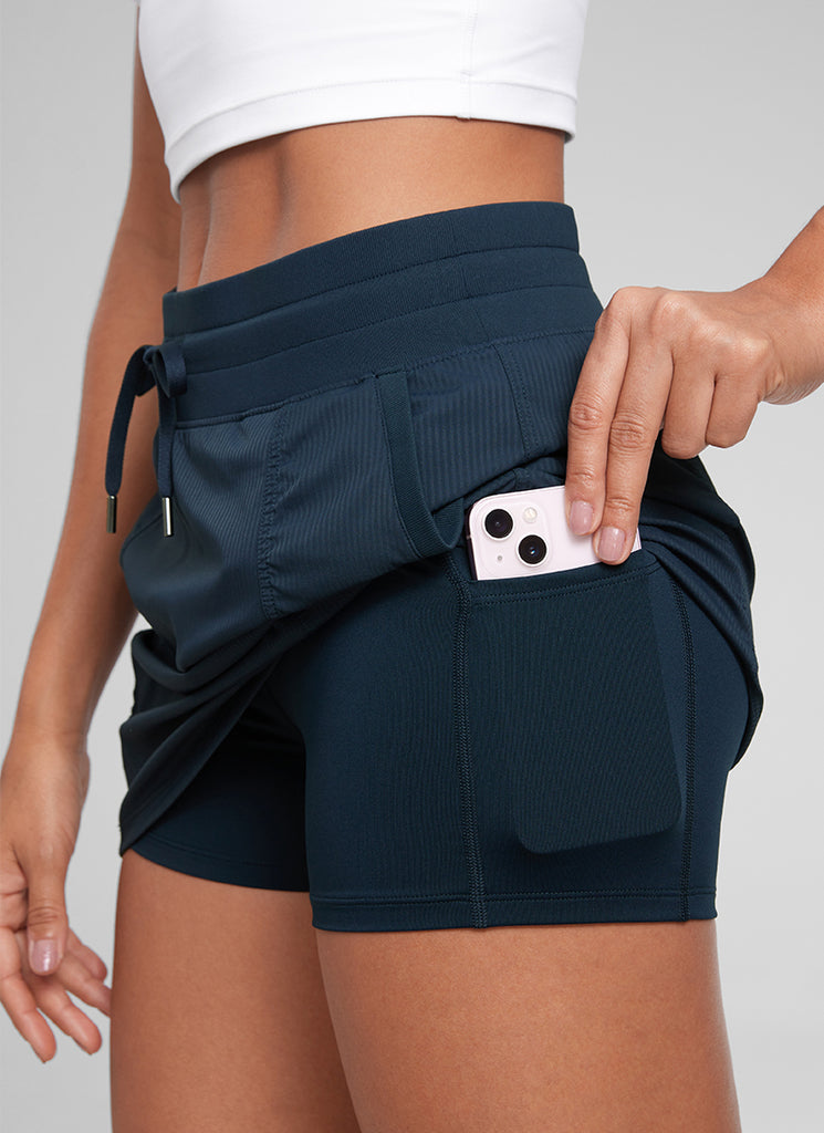 CRZ YOGA Women Golf Casual Athletic Drawstring Skirt with Side Pockets Ink Blue