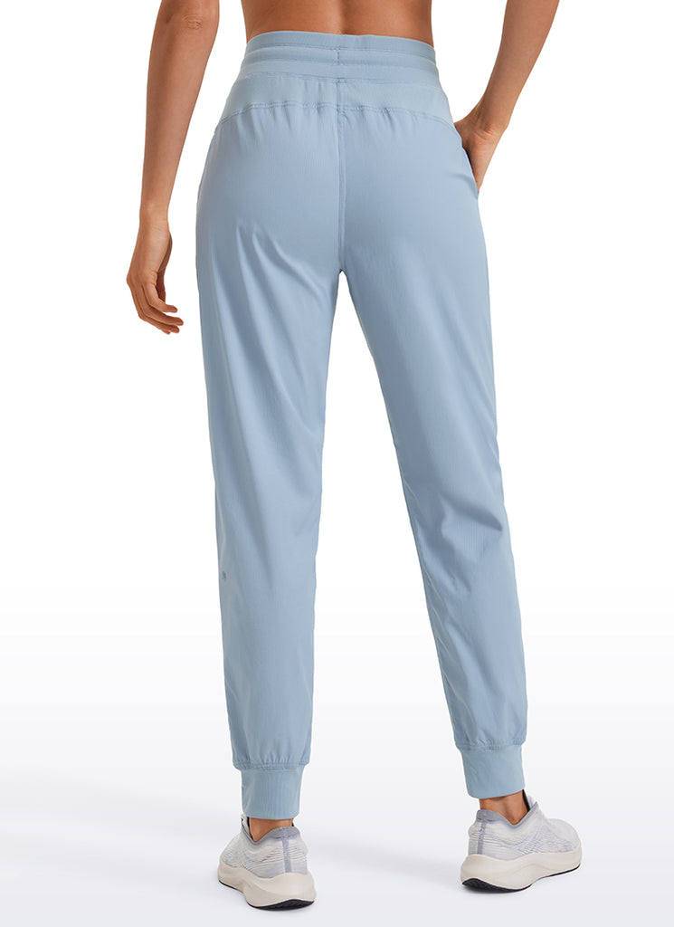 CRZ YOGA Women's Travel Classic Fit Striped Joggers 28'' Ruched Mist Powder