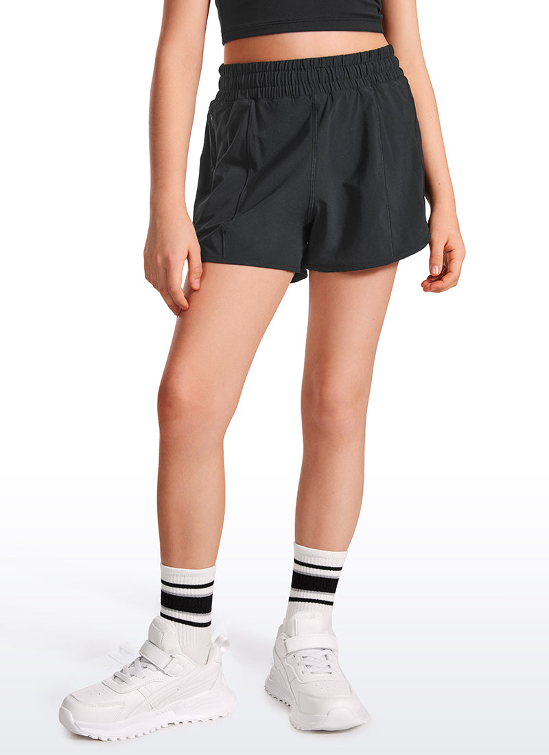 Short doublé en maille douce Feathery-Fit pour filles avec poches zippées