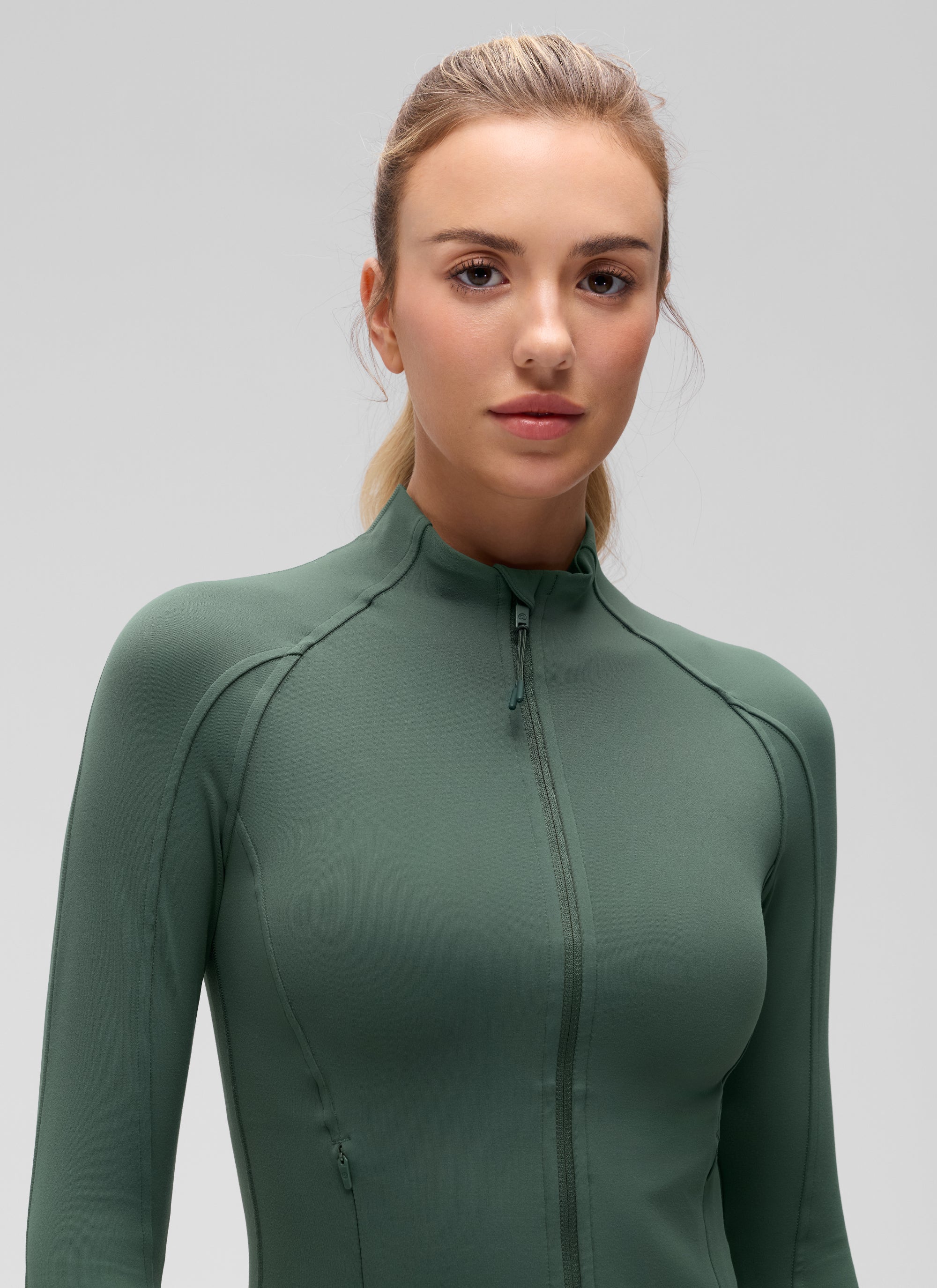 CRZ YOGA Women's Butterluxe Cropped Pocket Outerwear Full Zip Jackets Dark Forest Green @model_info:Anna